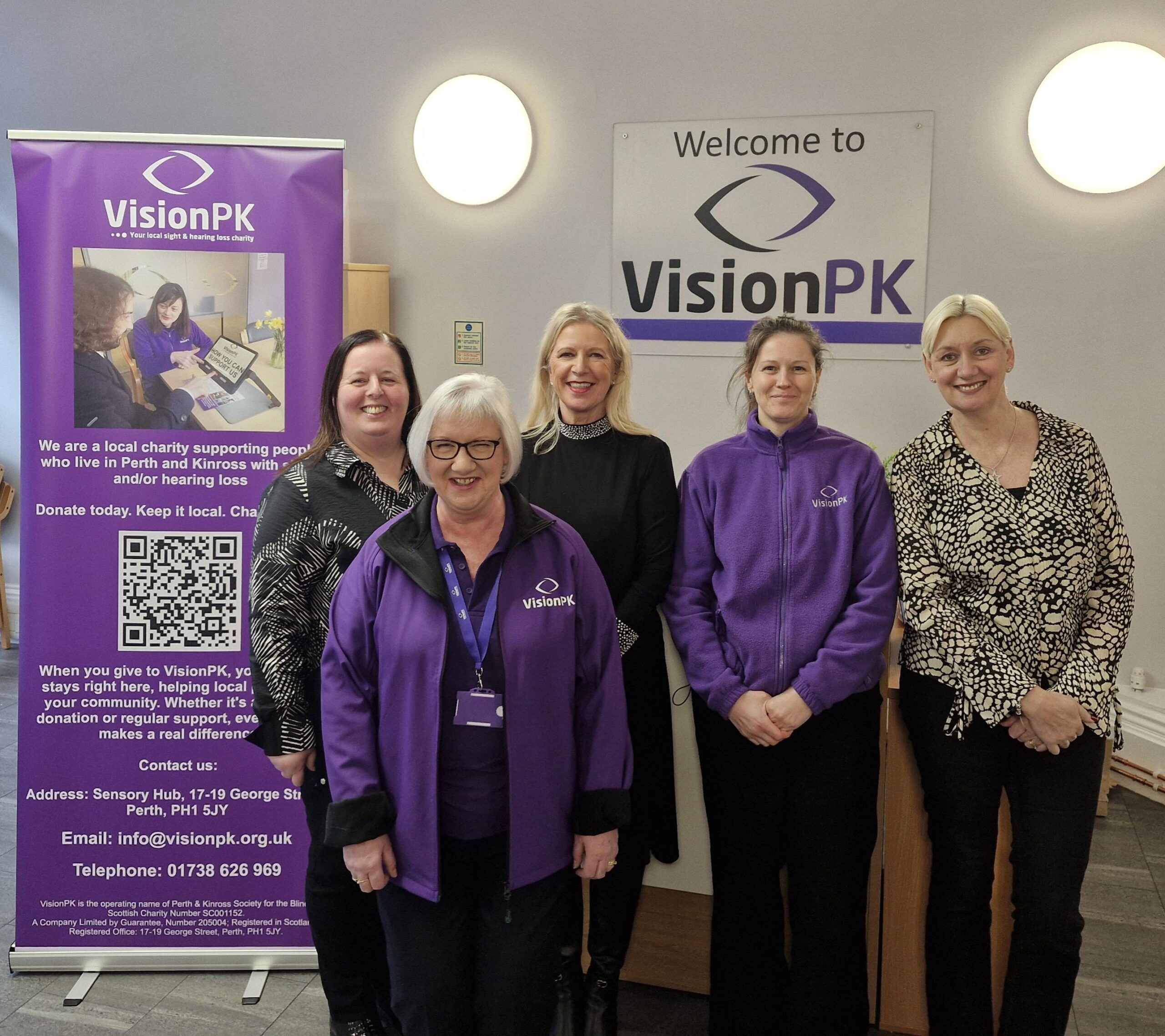 Katie from Premier Properties Perth visiting VisionPK’s George Street office, meeting the team and presenting their £100 charity donation.